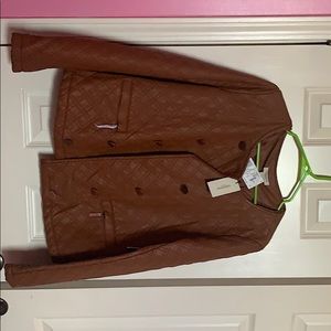 A medium chocolate leather jacket stylish